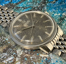 PSYCHEDELIC~1965 OMEGA STARRY NIGHT CALIBER. 550 AUTOMATIC